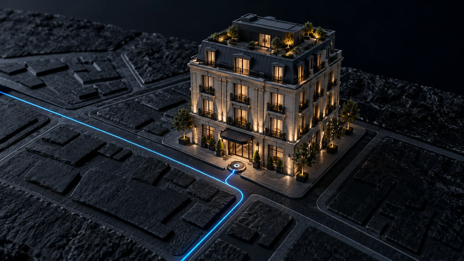 Maqueta de hotel sobre un mapa de piedra oscura, con una ruta azul que termina en la entrada.
